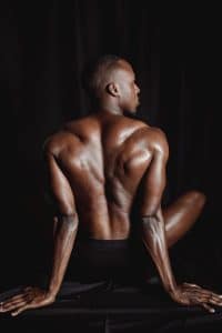 Topless Man in Black Bottoms in Lotus Position